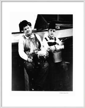 Плакат Oliver Hardy And Stan Laurel In 'Towed In A Hole'
